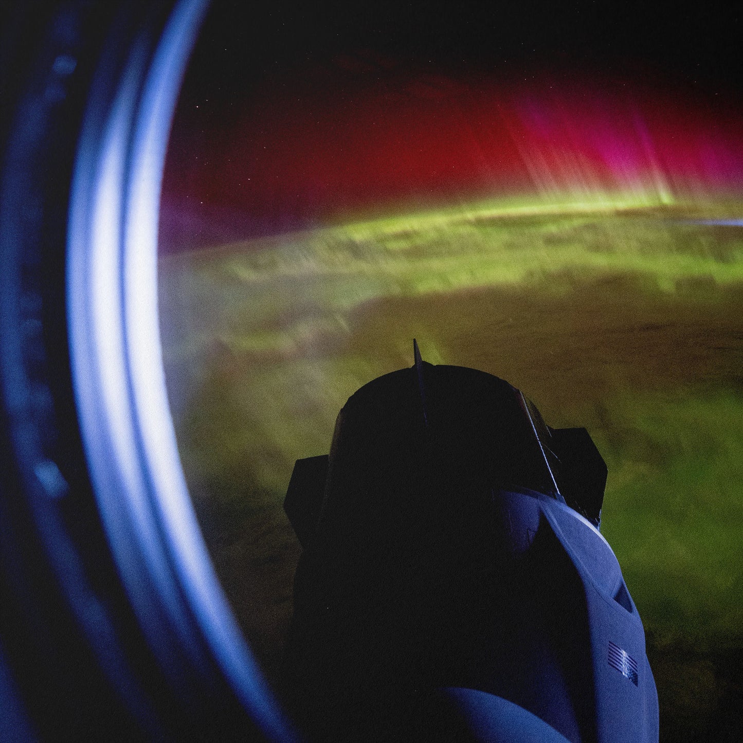 Red and Green Aurora Move Through Earth’s Atmosphere
