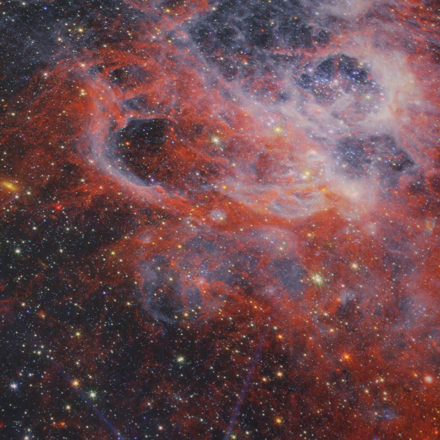 Peering Into the Tendrils of NGC 604